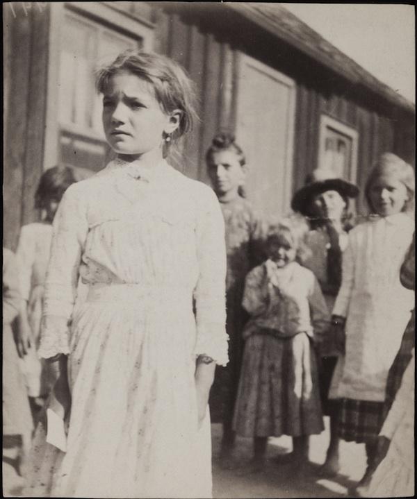 Sophie Shefel with a group of Children in Bohemian Flats, Saint Paul, Minnesota