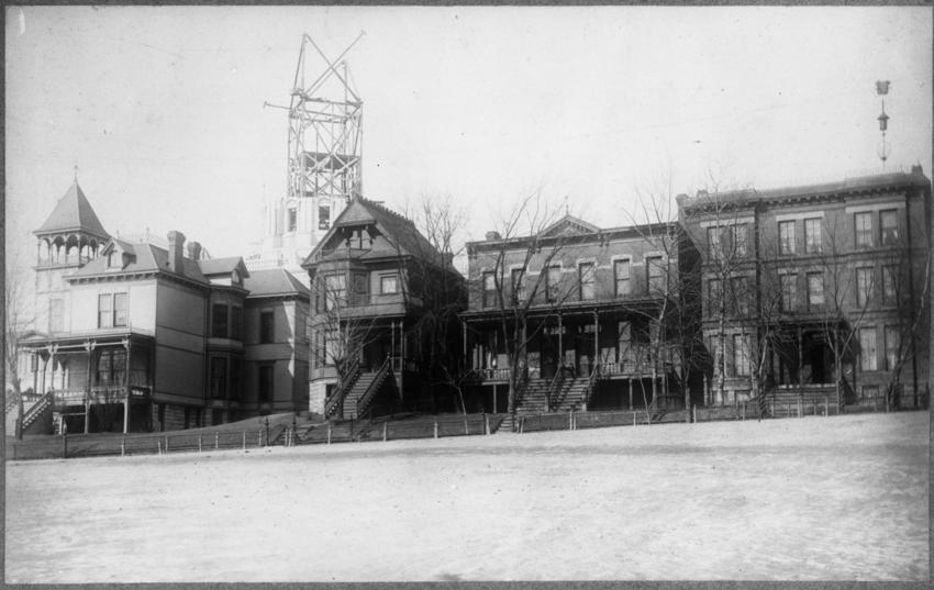 Capitol construction - hosues in foreground